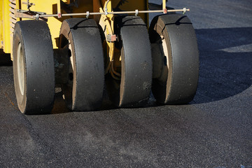 pneumatic asphalt roller at work