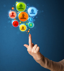 Social media icons coming out of gun shaped hand