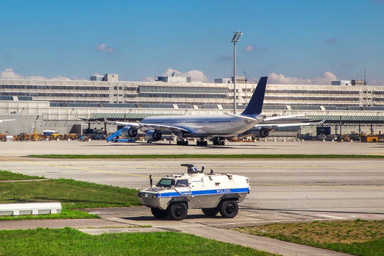 Police Vehicle Patrols Airport In Munich.