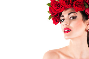 Naklejka premium portrait of beauty fashion model with red roses hairstyle