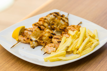 skewers of grilled squid and shrimp