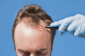 Man's Forehead Latex Hand
