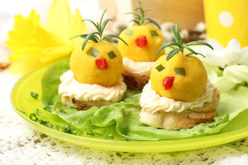 easter breakfast. Chickens made from egg yolk with mayonnaise pu