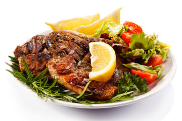Grilled steaks and vegetables