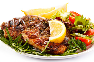 Grilled steaks and vegetables