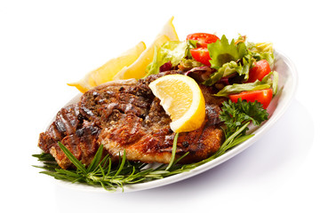 Grilled steaks and vegetables