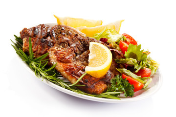 Grilled steaks and vegetables