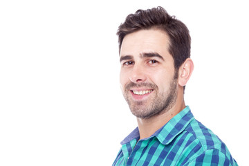 Fototapeta premium Portrait of a handsome latin man smiling, isolated over a white