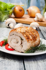 Pork lion roll stuffed with mushrooms