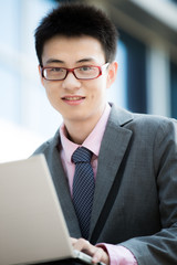 young businessman working outside