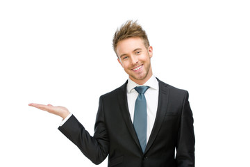 Half-length portrait of smiley manager with palm up