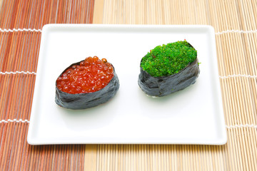 Gunkan with caviar on a plate