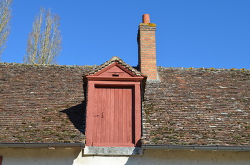 Lucarne et cheminée
