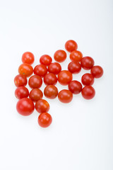 Fresh ripe cherry tomatoes isolated on a white background