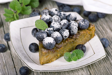Piece of cake with blueberries