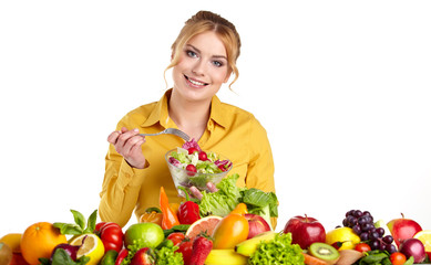 Happy young woman with vegetables and fruits. Isolated over whit