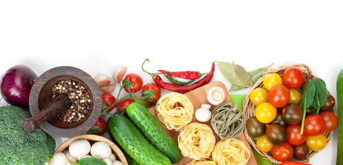 Fresh ingredients for cooking: pasta, tomato, cucumber, mushroom