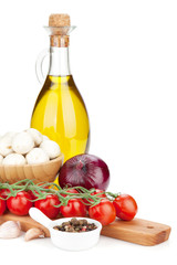 Fresh ingredients for cooking: tomato, mushroom and spices