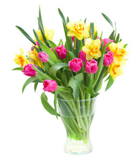 Fototapeta na wymiar bouquet of tulips and daffodils in vase