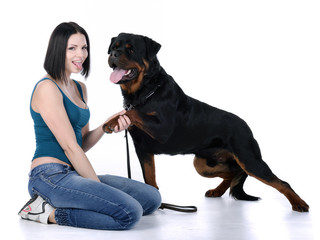 Woman with a Rottweiler dog