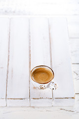 espresso coffee in white cup on old rustic  style table