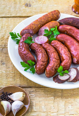 plate full various species sausages