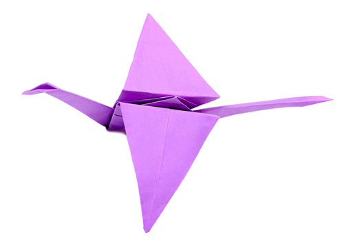 Origami crane isolated on white