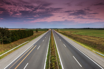 Cars speeding on a highway