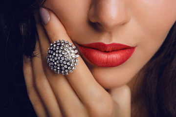 Red lips with the ring. Make up