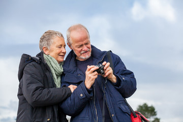 Elderly couple taking a self portrait