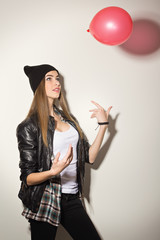 Cute hipster girl with balloon