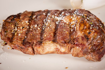 Grilled beef steak with seasoning
