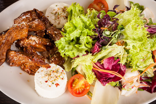 Grilled Beef Stripes Fresh Salad And Goat Cheese