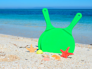 Fototapeta na wymiar green beach rackets