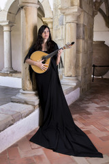 beautiful girl dressed as a fado performer