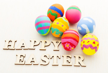 Colourful design easter egg and wooden letter