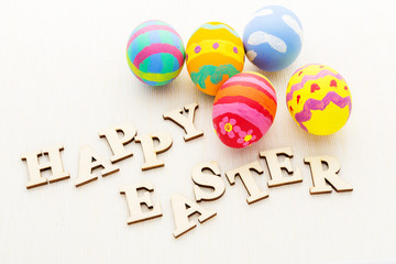 Decorated easter egg with wooden text