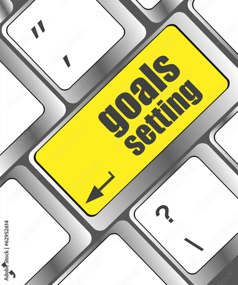 Poster goals setting button on keyboard with soft focus