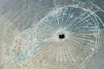 Car with bullet holes in the windshield