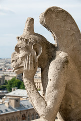 Fototapeta na wymiar Bored Gargoyle of Notre Dame III