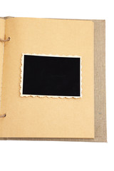 Naklejka premium Blank old photos in album, isolated on white