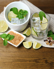 Ingredients for lemonade on wooden table