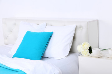 Comfortable soft bed with pillows