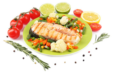 Tasty grilled salmon with vegetables, isolated on white