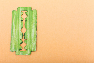 Razor blade on color background