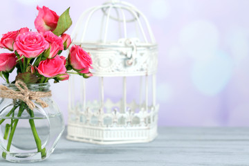 Beautiful small pink roses, on light background