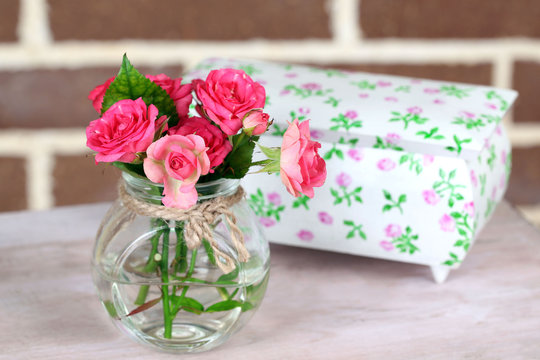 Beautiful still life with small pink roses