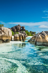 Anse Sous d'Argent beach with granite boulders - obrazy, fototapety, plakaty