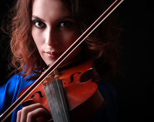 Beautiful young girl with violin