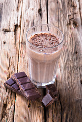 Fresh milk shake on wood